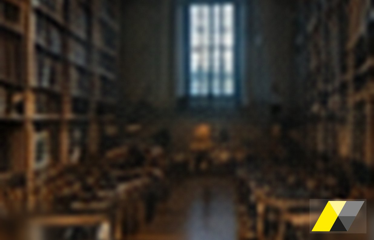 Sala di lettura in penombra con alte scaffalature di libri: arresto e udienza di convalida, Soardi Studio Legale