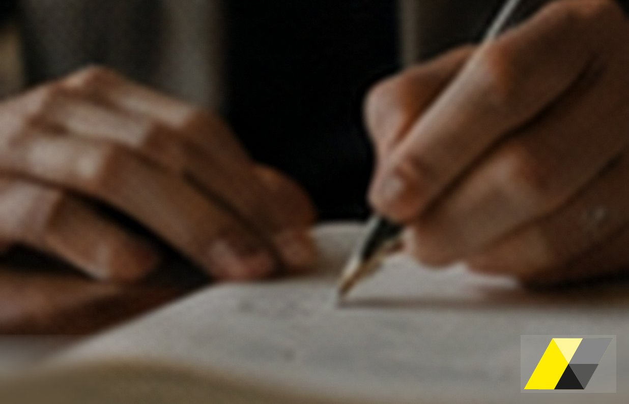 A hand signing a document with a fountain pen: drafting the Model 231 of an Italian subsidiary